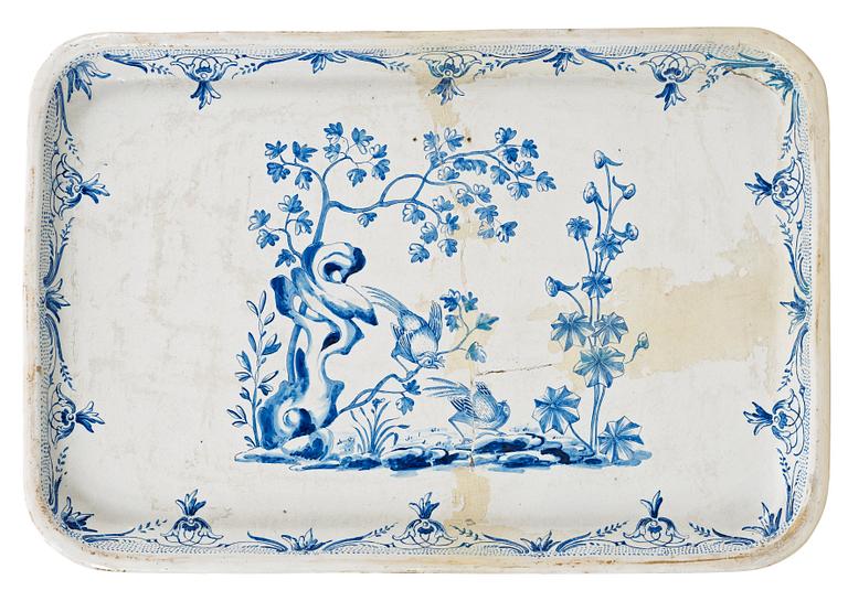 A Swedish Rococo faience tea table Rörstrand 1757.