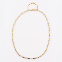 Collier, Jarl Sandin, 18K guld och vitguld med små briljantslipade diamanter.