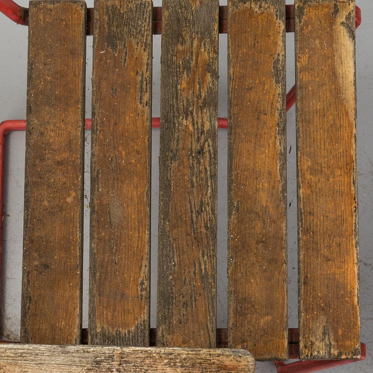 A garden table and four chairs, 20th century.