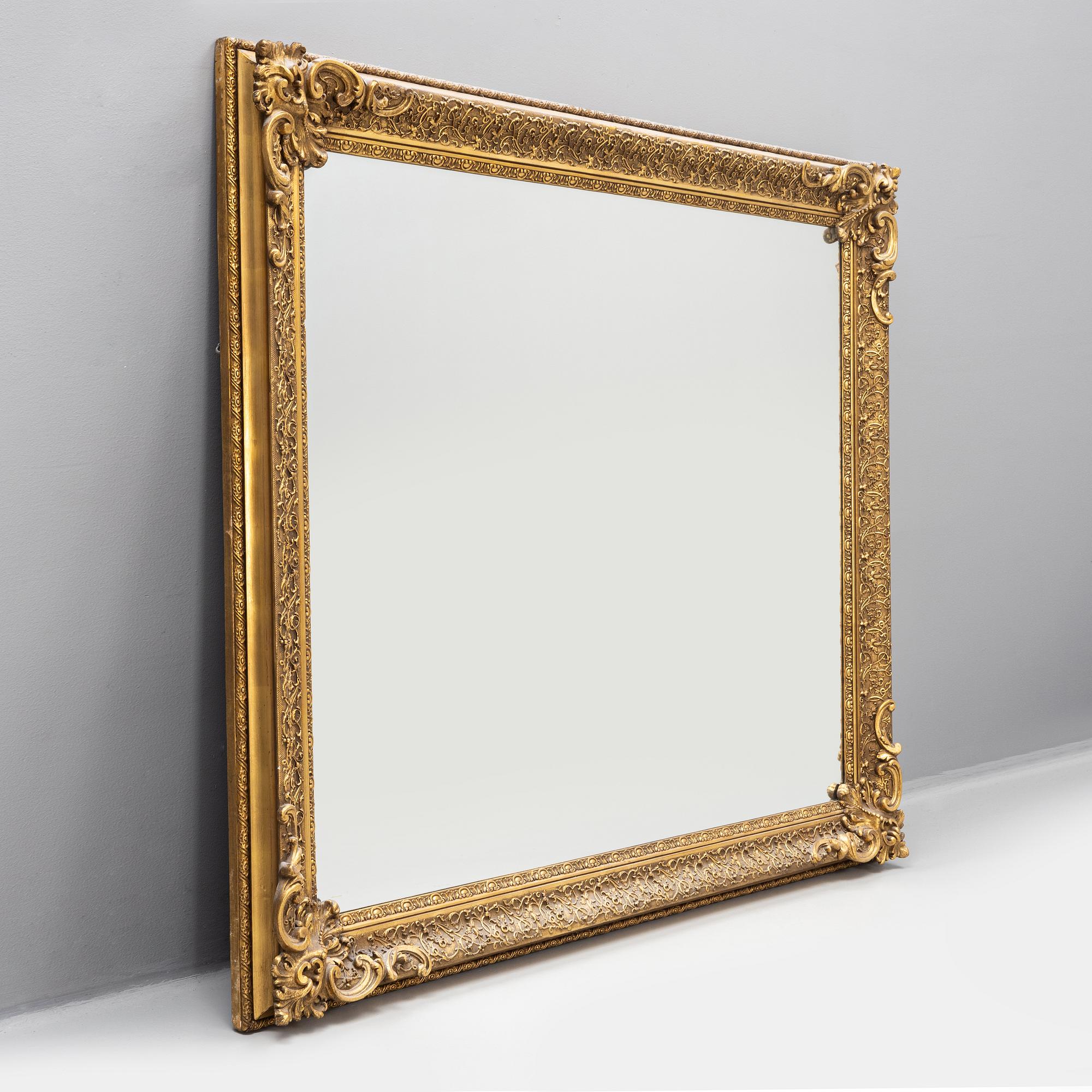 A frame/mirror, around the year 1900.