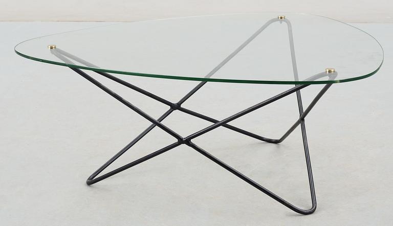 A Jacques Tournus glass and metal sofa table by Airborne.