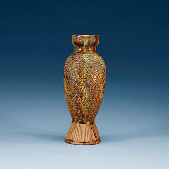 A potted fish shaped vase, presumably Tang dynasty.