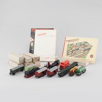 A collection of mainly Fleischmann toy trains, 12 pieces from the second half of the 20th century.