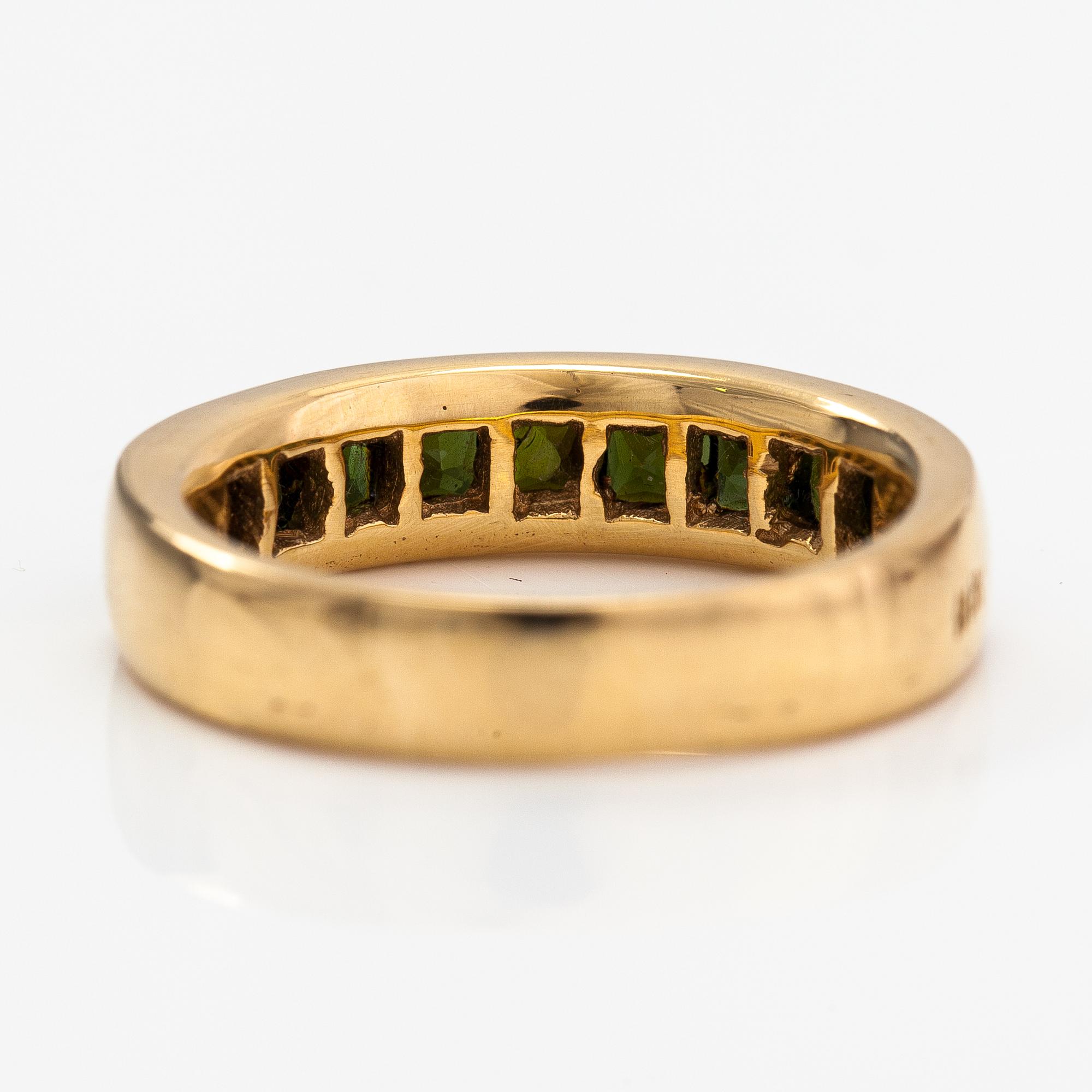 An 18K gold ring with tourmalines. Finland 2002.
