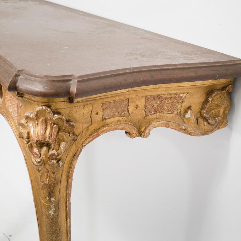 A rococo style console table,