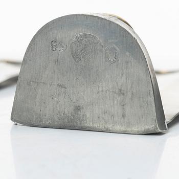 Nils Fougstedt, a matched pair of pewter and brass wall sconces, model A 60, Svenskt Tenn, Stockholm 1929 and 1932.