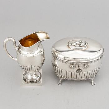 CF Carlman, a silver sugar box and creamer, Stockholm, 1899-1901.