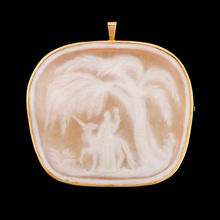 A CAMEO PENDANT / BROOCH, 18K gold. Eva Gyldén 1957, set by Heikki Kaksonen, Helsinki Finland 1962.