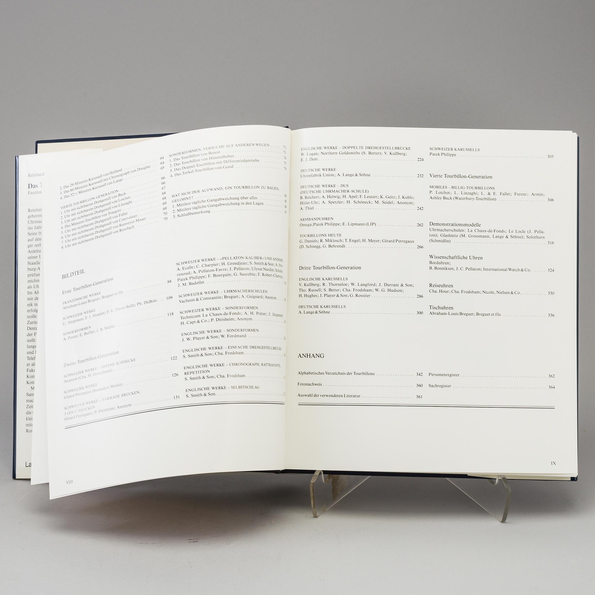 A set of 5 watch books.