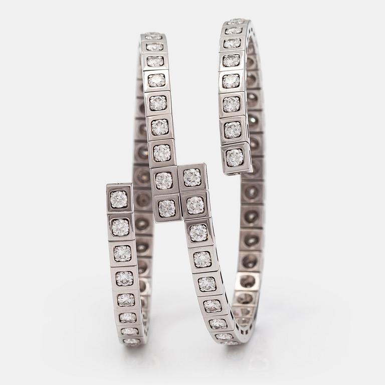 Cartier, Rannekoru "Tectonique", 18K valkokultaa, briljanttihiottuja timantteja n. 11.90 ct yht. Merkitty CT6808, JC.