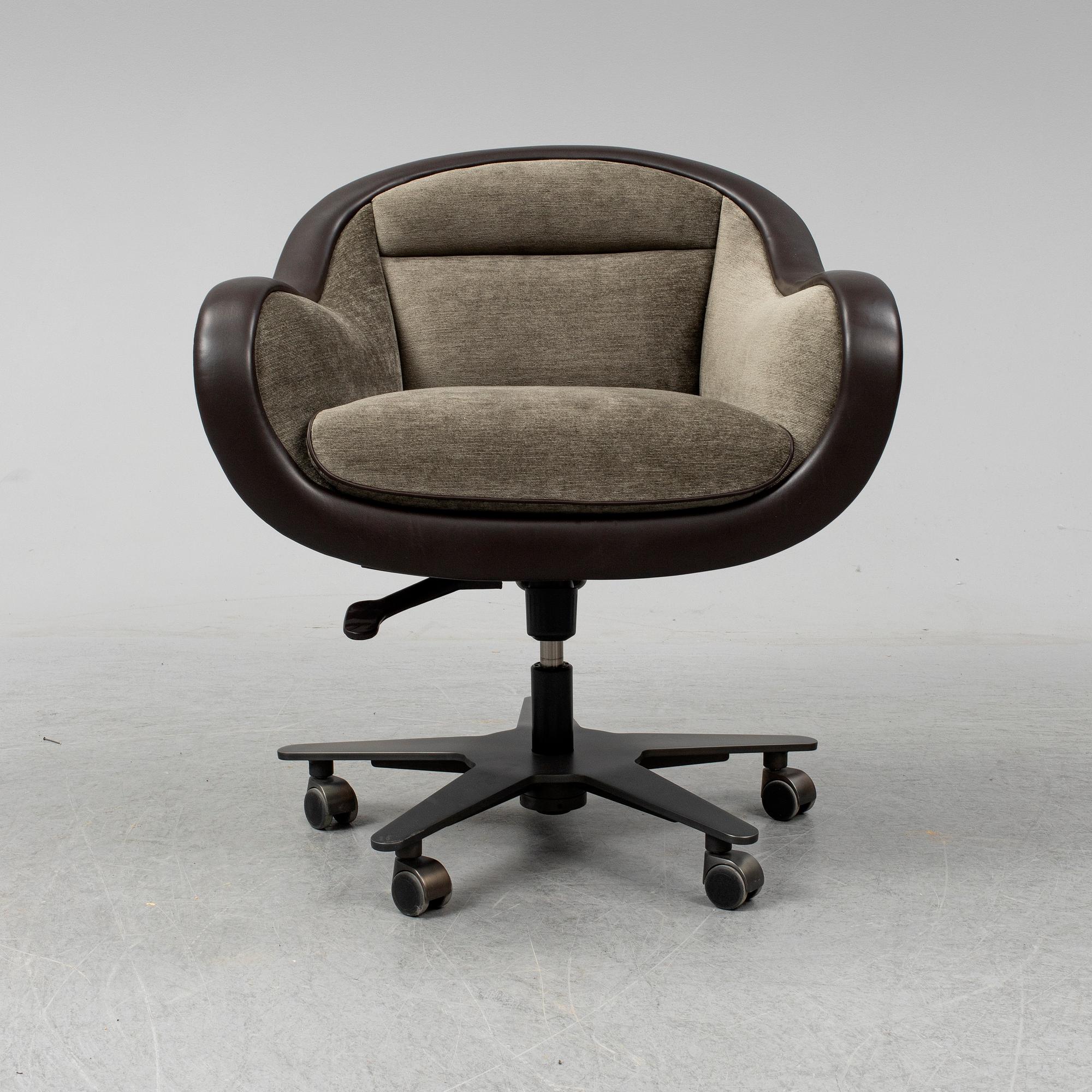 An contemporary 'Vittoria' office chair by Romeo Sozzi for Promemoria furniture.