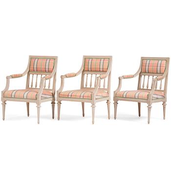55. A set of three late Gustavian open armchairs, late 18th century.