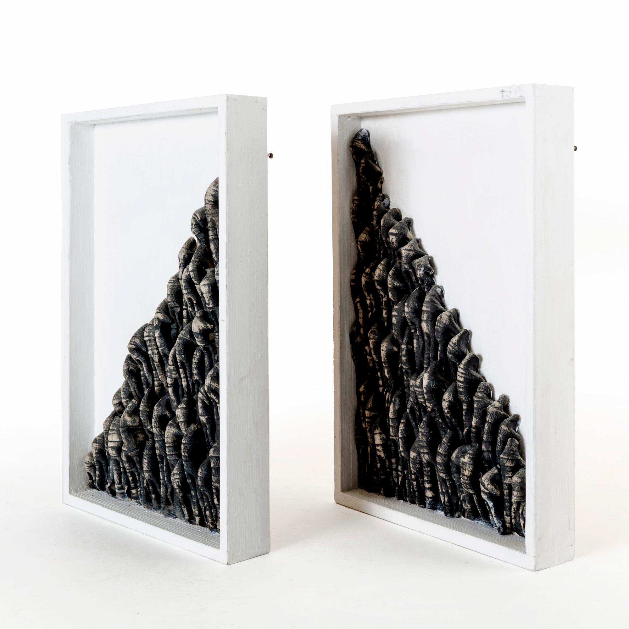 Ulla Viotti, a set of stoneware and wood wall reliefs.