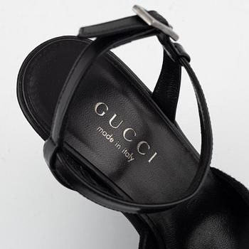 Gucci, a pair of wedge heel shoes, Italian size 36.
