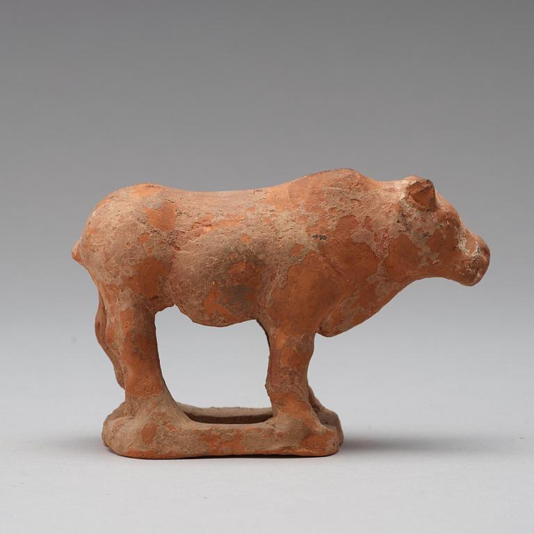 Three pottery scultpures of animals and a herdsman, Tang dynasty (618-906).