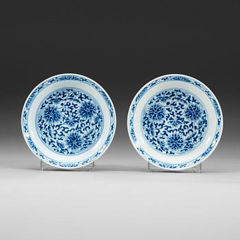 20. A pair of blue and white lotus dishes, Qing dynasty (1644-1912) with Daoguang seal mark.