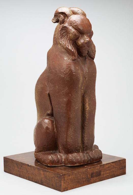 A Michael Schilkin stoneware sculpture of a seated lynx, Arabia.