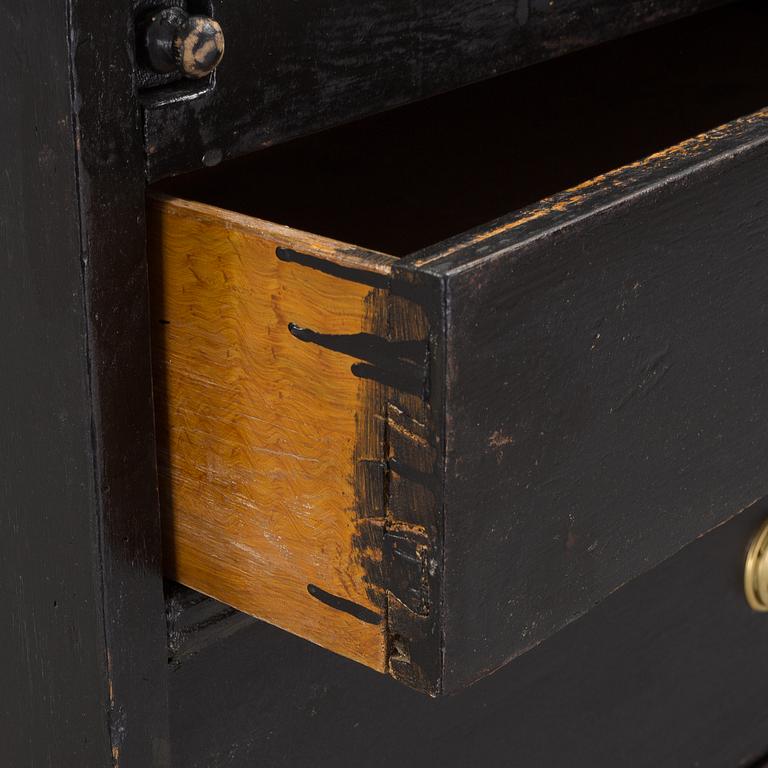 a chest of drawers from the 19th century.