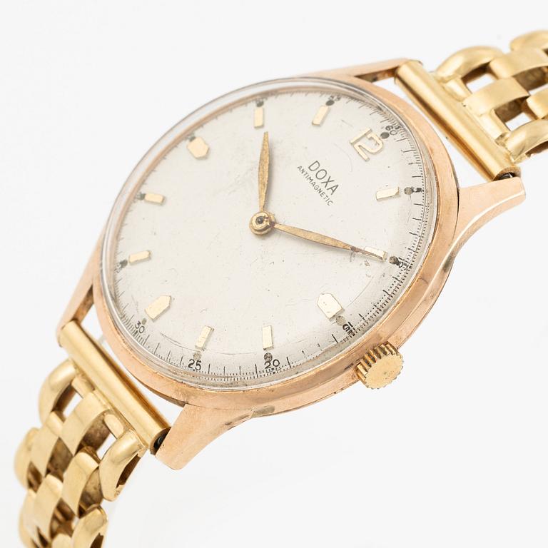 Doxa, 14K, wristwatch, bracelet in 18K, 37 mm.