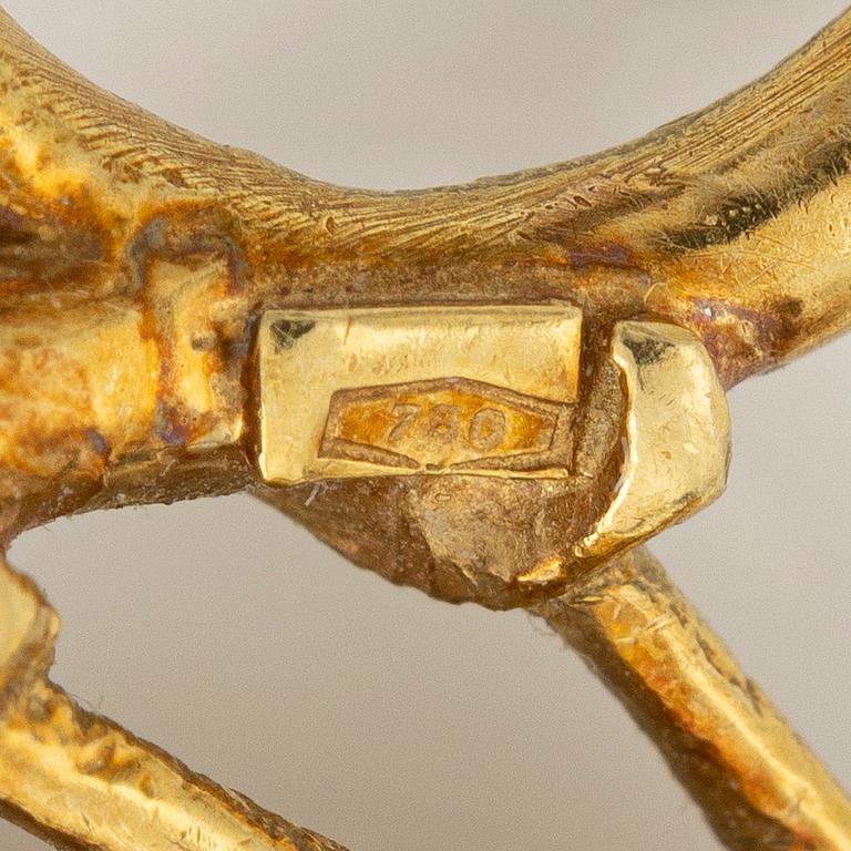 Brosch i form av en fågel 18K guld med åttkantslipade diamanter.