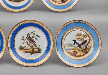 A set of 10 French ornitological dessert plates, signed Schoelber, 19th Century. (8+2).