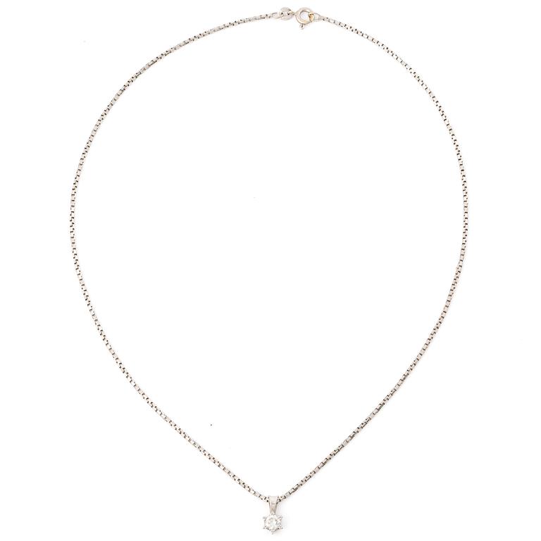 Pendant with chain in the shape of a star with a brilliant-cut diamond.