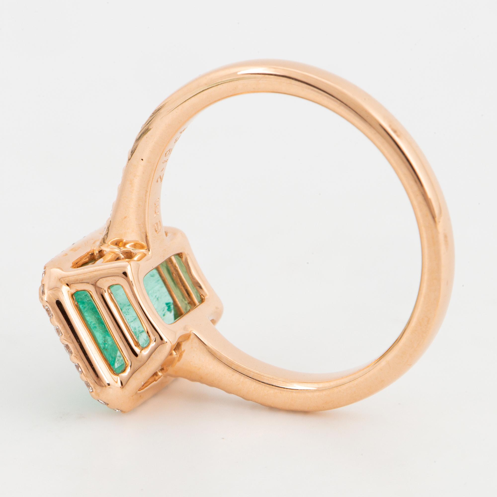 Emerald-cut emerald and brilliant-cut diamond ring.