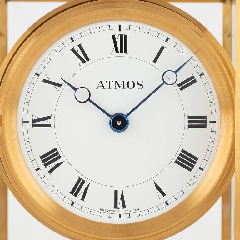 Jaeger LeCoultre, an Atmos table clock.