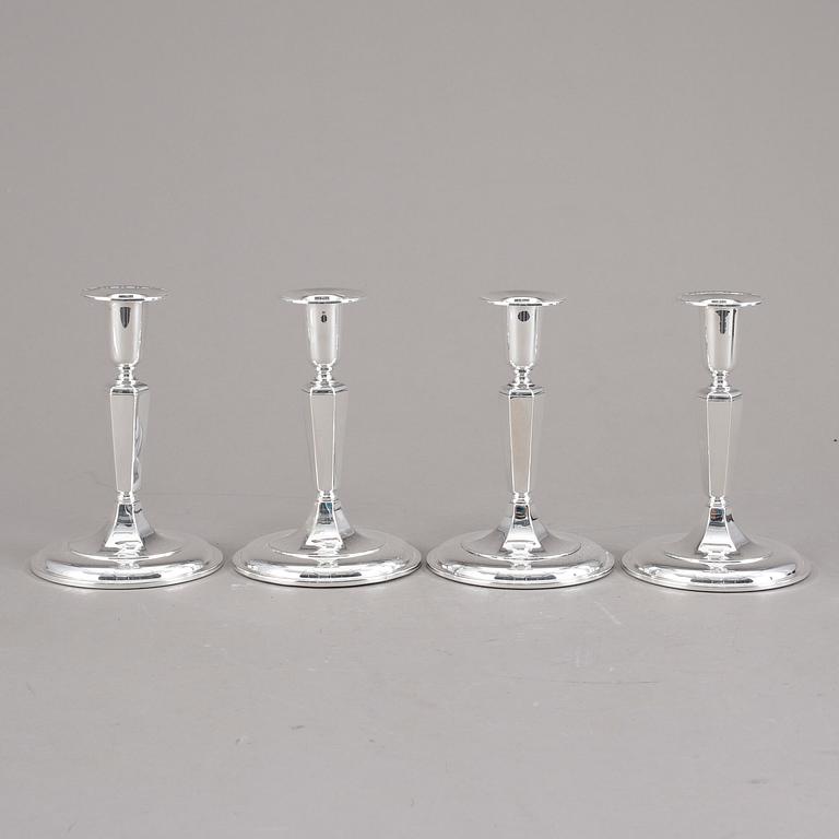 LJUSSTAKAR, 4st snarlika, silver, K&EC, Göteborg, 1956.
