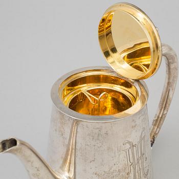 A Russian parcel-gilt teapot, mark of Nicols Karl & Plinke, St Petersburg, 1880/90s.