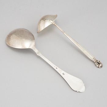 Johan Rohde, an 'Acorn' sterling sauce ladle, Georg Jensen post 1945 + a Danish silver serving spoon, Copenhagen 1931.