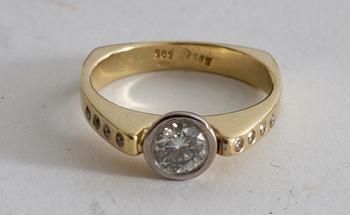 RING, guld 14K med briljant c:a 0.59 ct.