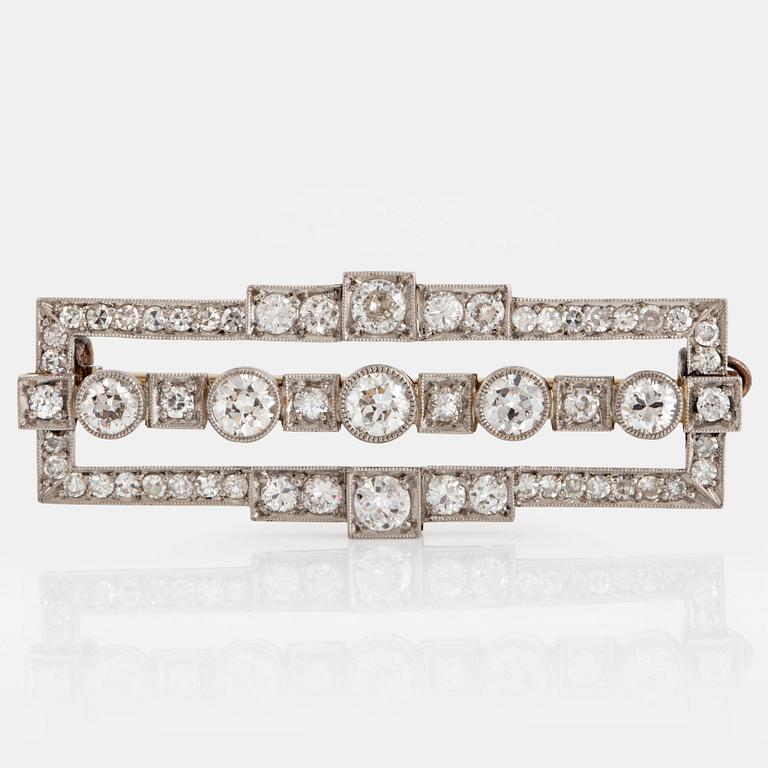 A platinum and gold brooch set with old- and eight-cut diamonds with a total weight of ca 2.00 cts.