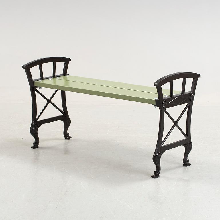 A Folke Bensow cast iron and wood park bench, Näfveqvarn, 20th Century.