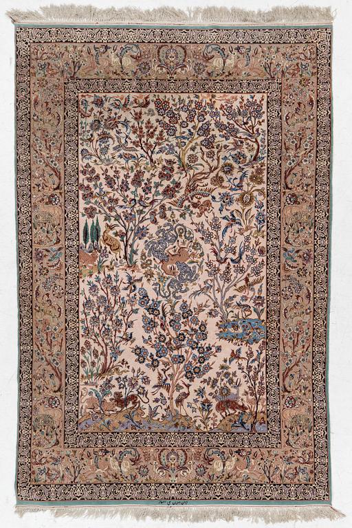 A signed pictoral Isfahan rug, Central Persia (Iran), signed, c. 235 x 154 cm.