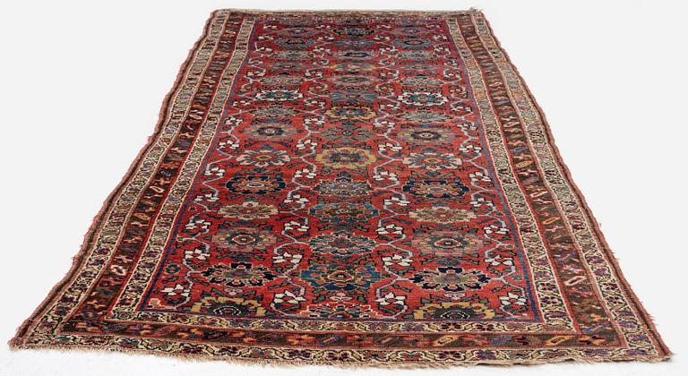 An antique Bidjar carpet, West Persia, c. 352 x 148 cm.