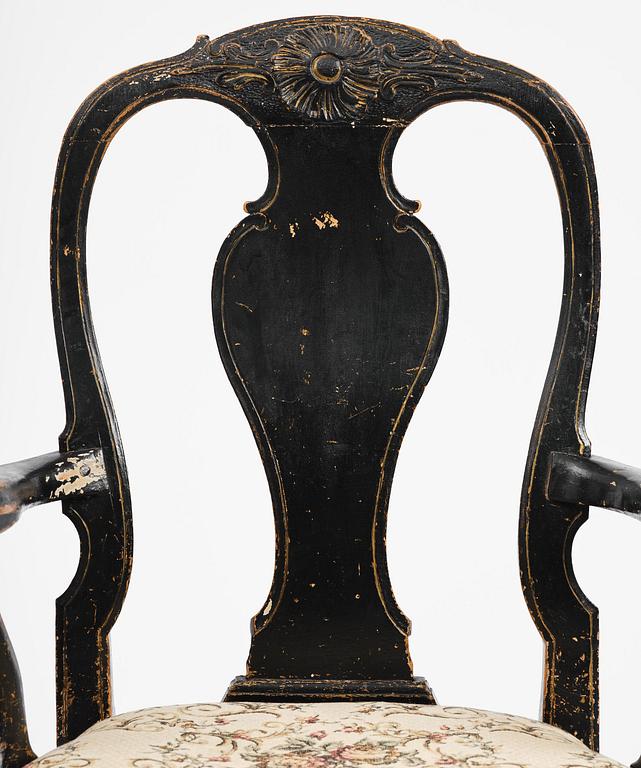 A pair of rococo armchairs in the manner of C. M. Sandberg, later part 18th century.