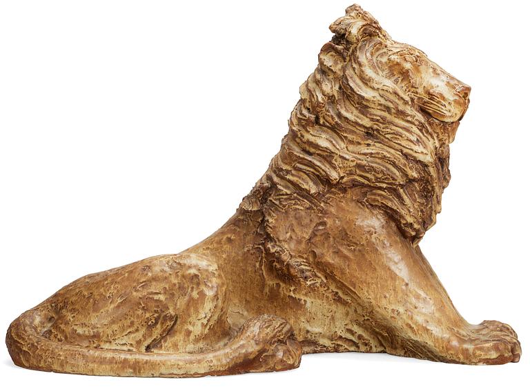 A Michael Schilkin stoneware sculpture of a lion, Arabia, Finland, 1940's.