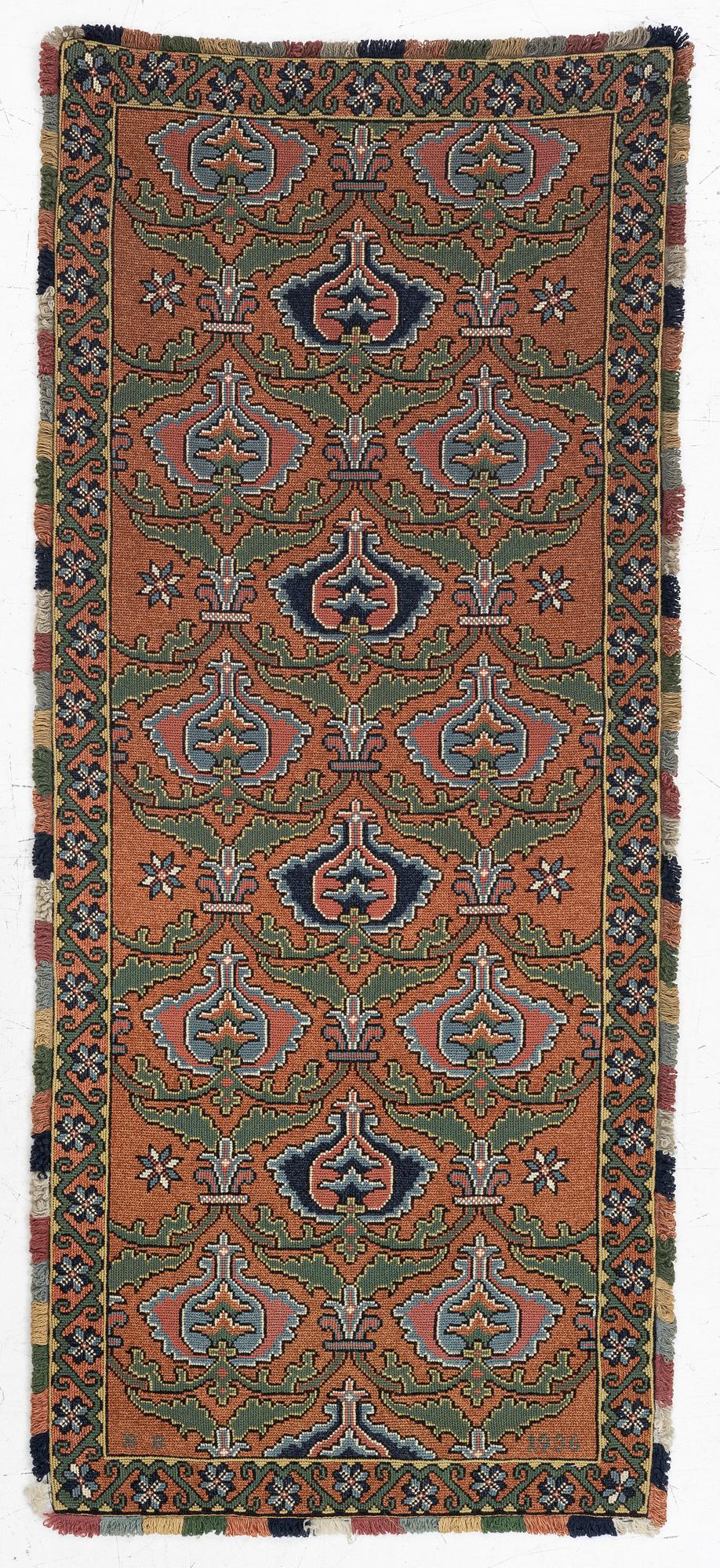 A sleigh cushion, signed BB and dated 1936, c. 160 x 67 cm.