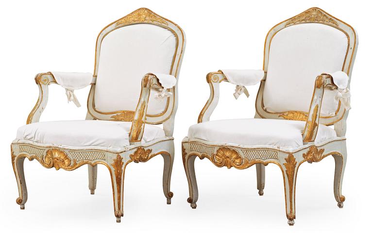 A pair of Rococo 18th century armchairs.