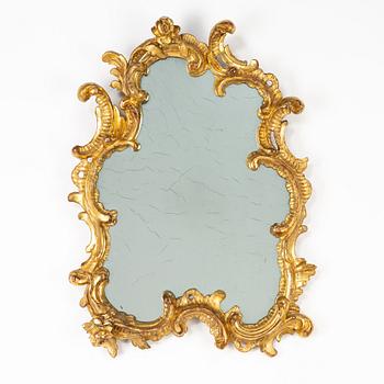 An Italian Rococo mirror, 18th century.
