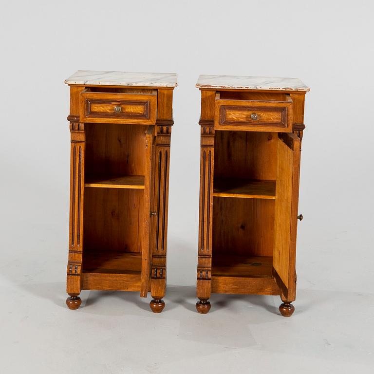 A pair of Neo Renaissance  bedside tables.