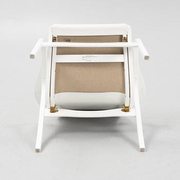 Yngve Ekström, a 'Lamino' armchair, Swedese, dated 2010.