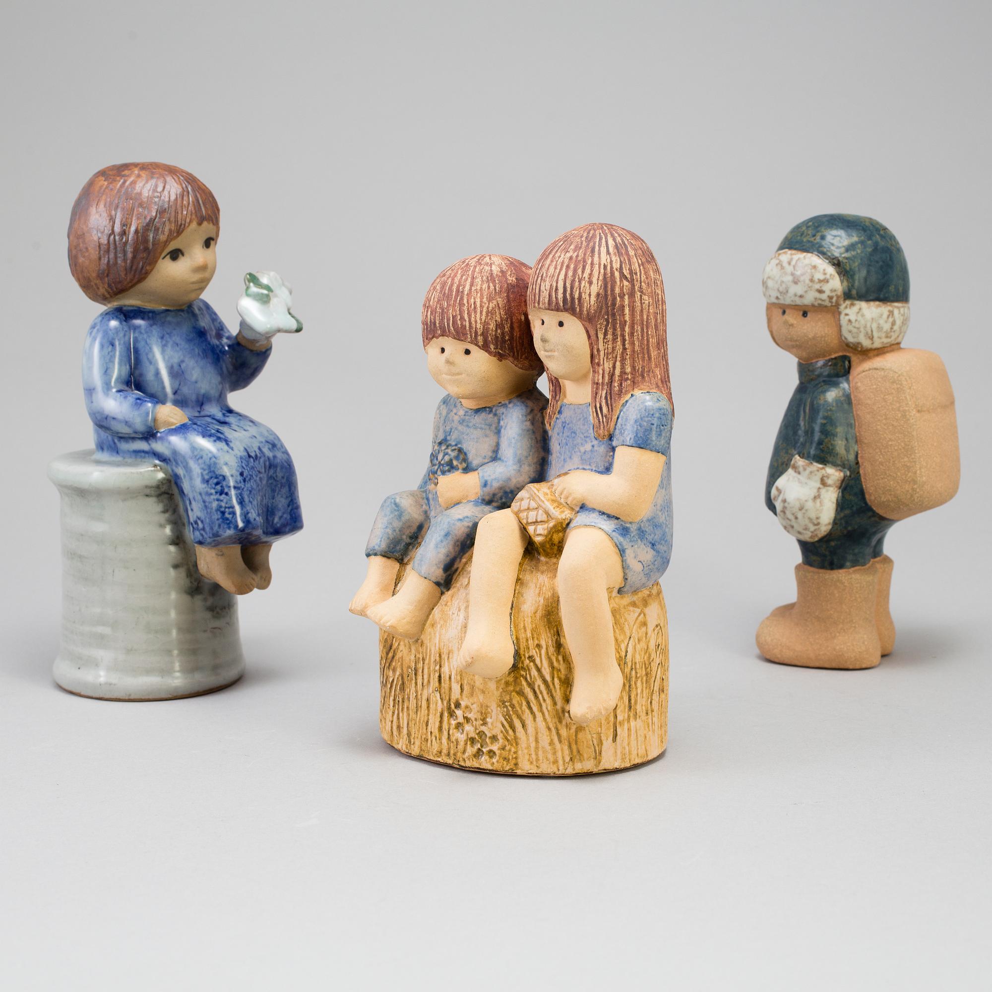 a set of three stoneware figurines by Lisa Larson for Gustavsberg.