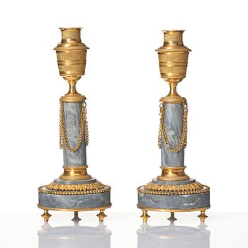 A pair of Louis XVI ormolu and marble cassolettes, late 18th century.