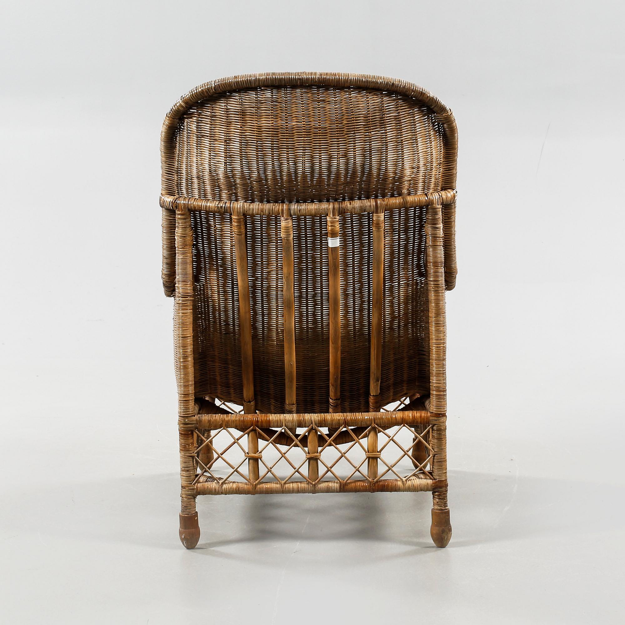 A rattan arm chair from the second half of the 20th century.