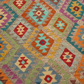 A kilim from Uzbekistan, around 280 x 210 cm.