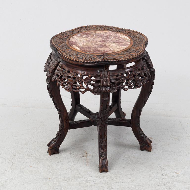 A Chinese carved wood and stone top side table, 20th Century.