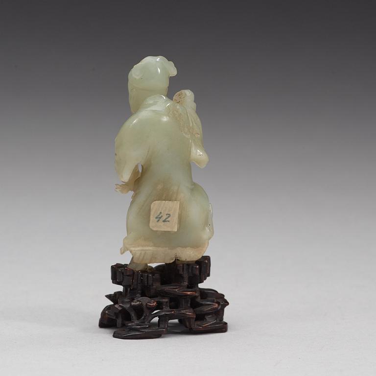 A nephrite sculpture of a man, Qing dynasty (1644-1912).