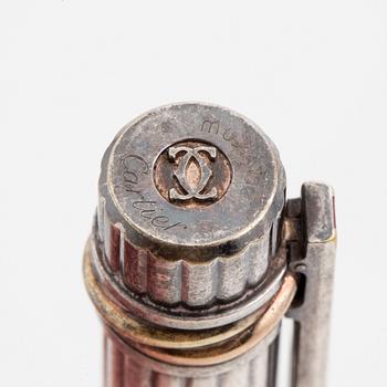 A Cartier lighter and pen.